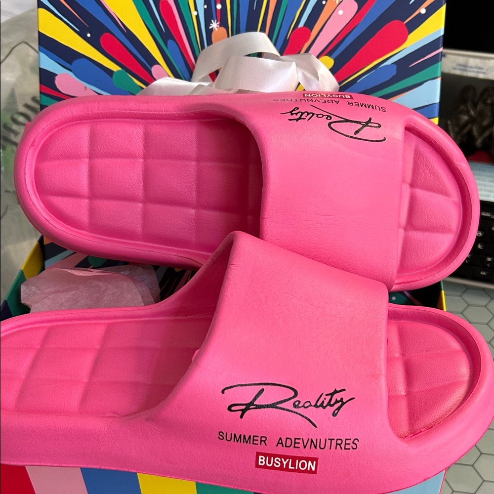 Reality Pink Slide Sandals —